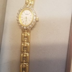 Watch .Genuine Diamonds Swiss Quarte Assembled  in USA with three extra to size